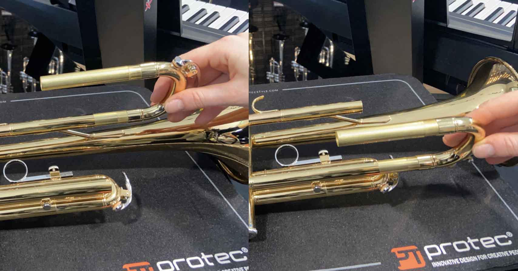 Each side of the tuning slide is being inserted and moved around inside the receiver on the trumpet.